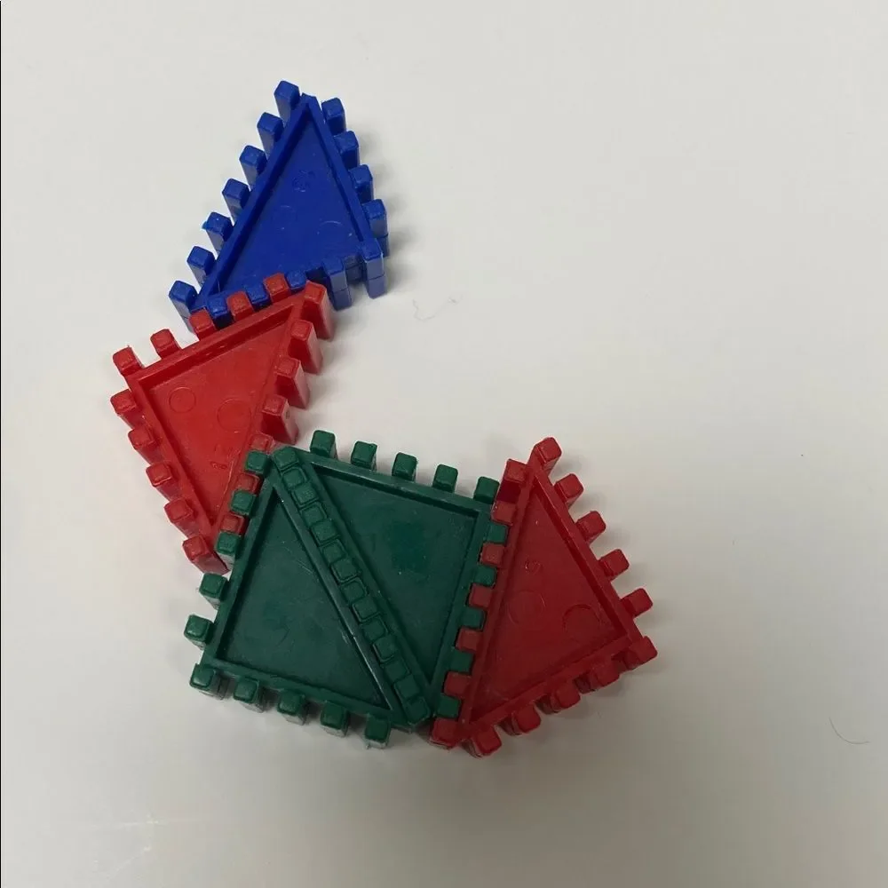 Seventy One Piece Colorful Interlocking Triangle Building Blocks for Kids.